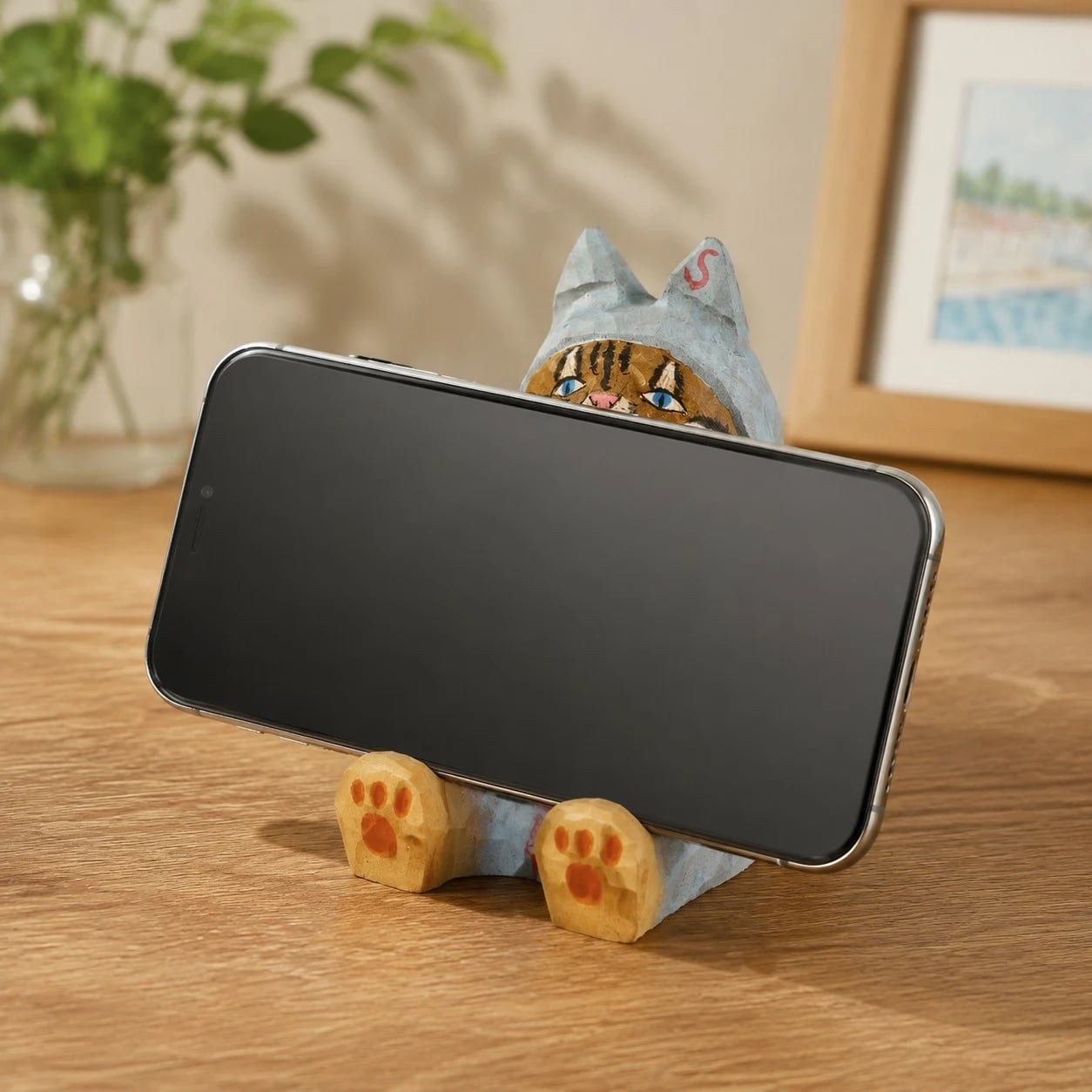 Wooden animal phone stand scene view