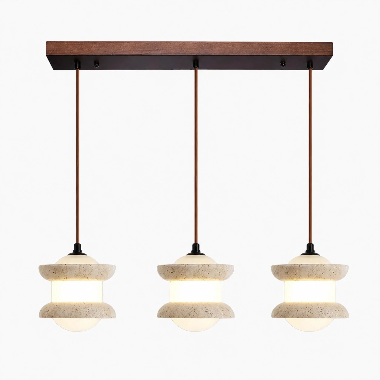 Three-light travertine stone pendant light on a plain background