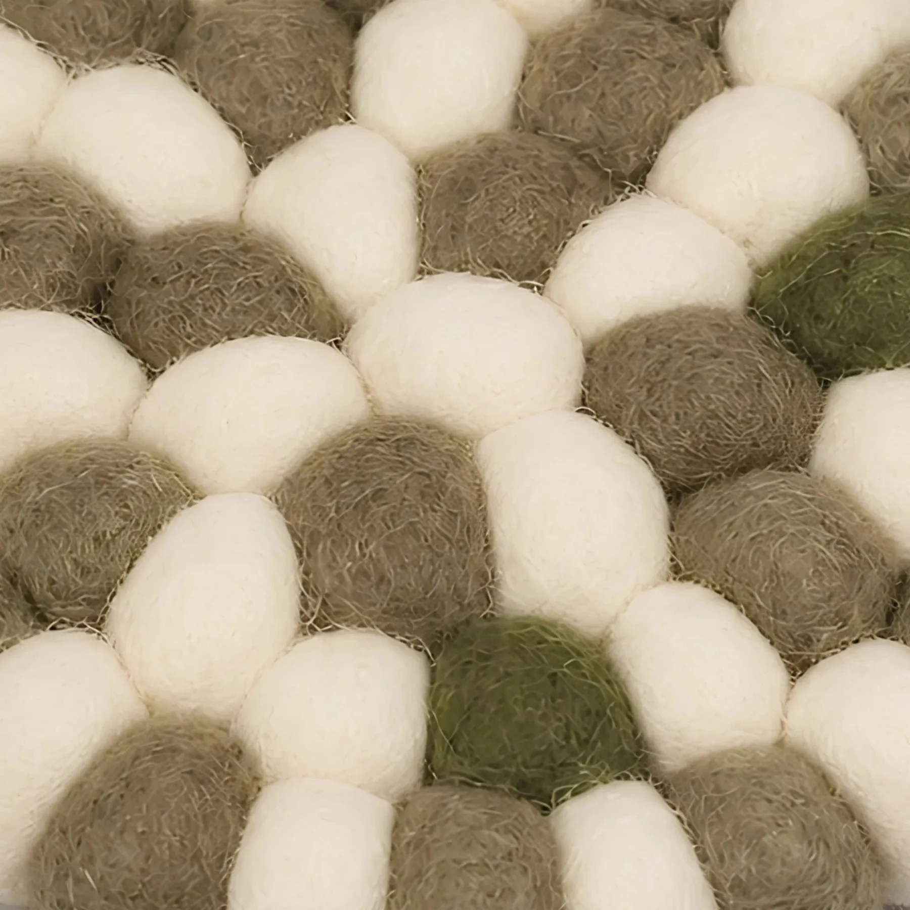 Close view of soft felt ball texture
