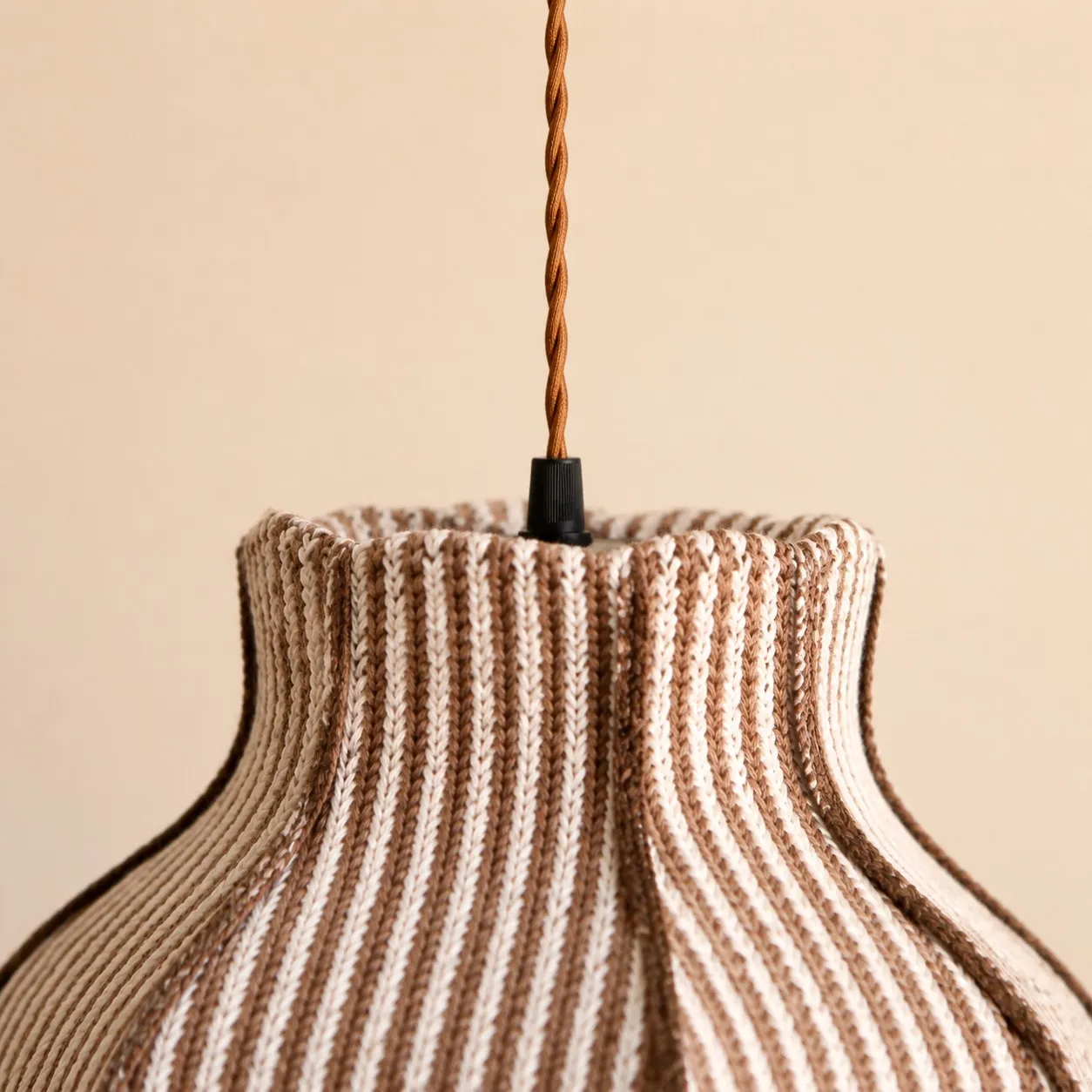 Twisted cord and upper shade connection detail