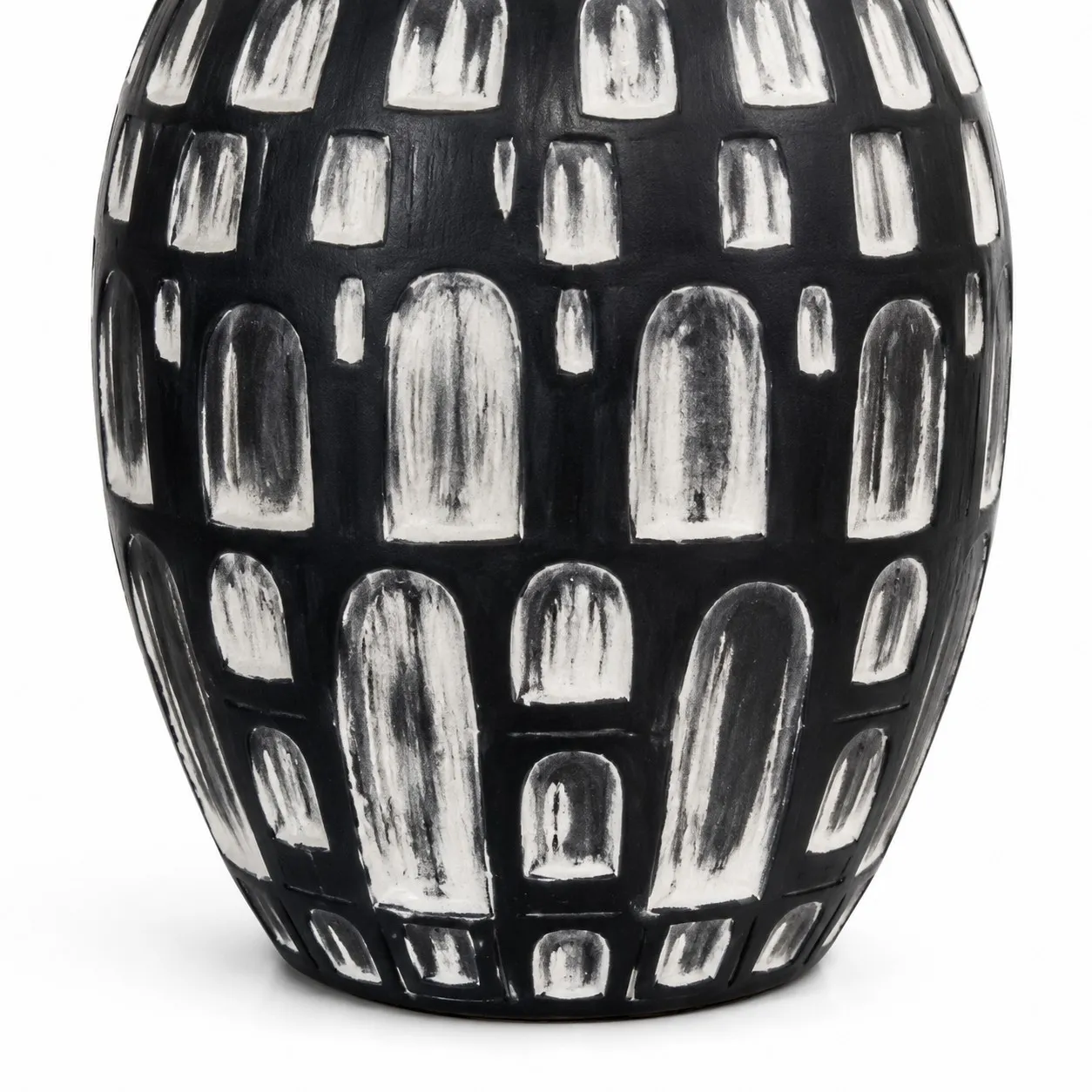 Black and white hand-finished ceramic base detail